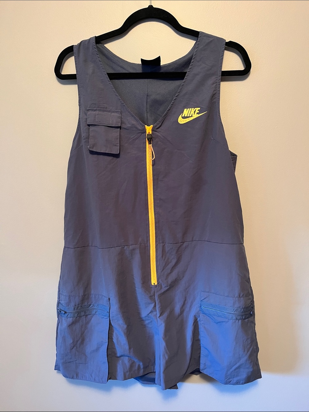 NIKE Icon Clash Romper in Navy and Bright Orange